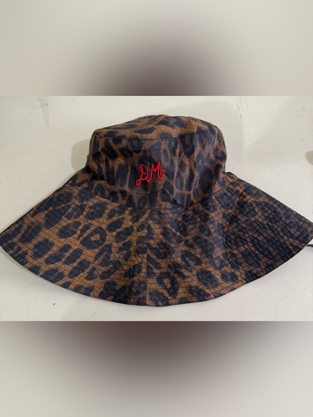Damson Madder Leopard-Print Bucket Hat with Red 'LM' Stitching